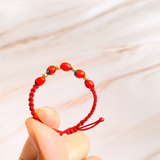 Pulsera Huayruro bebé